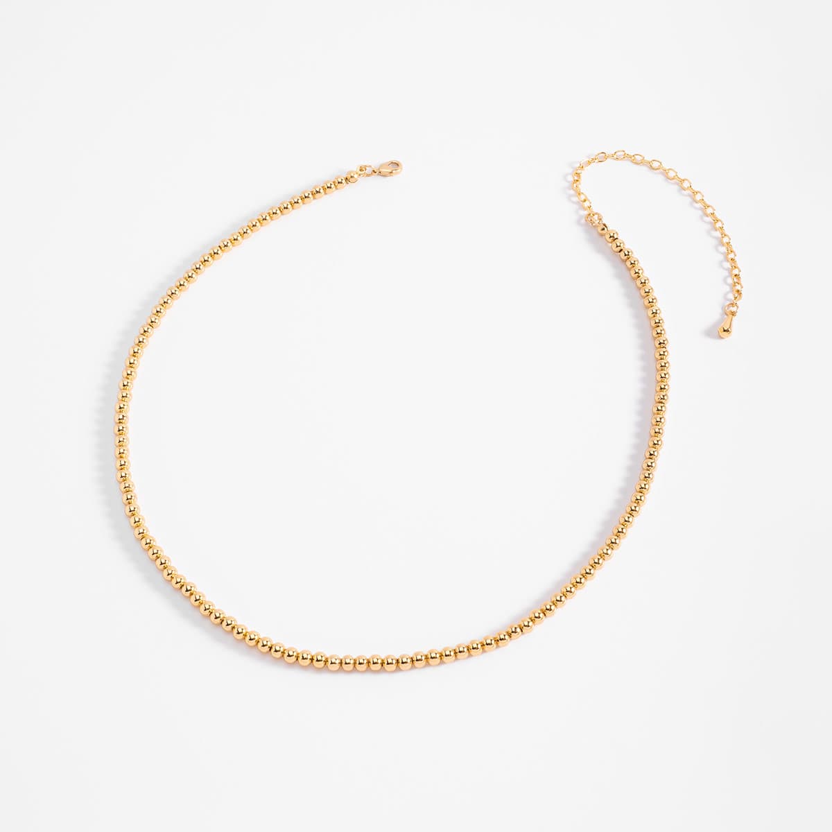 Collar de esferas en baño de oro diseño minimalista